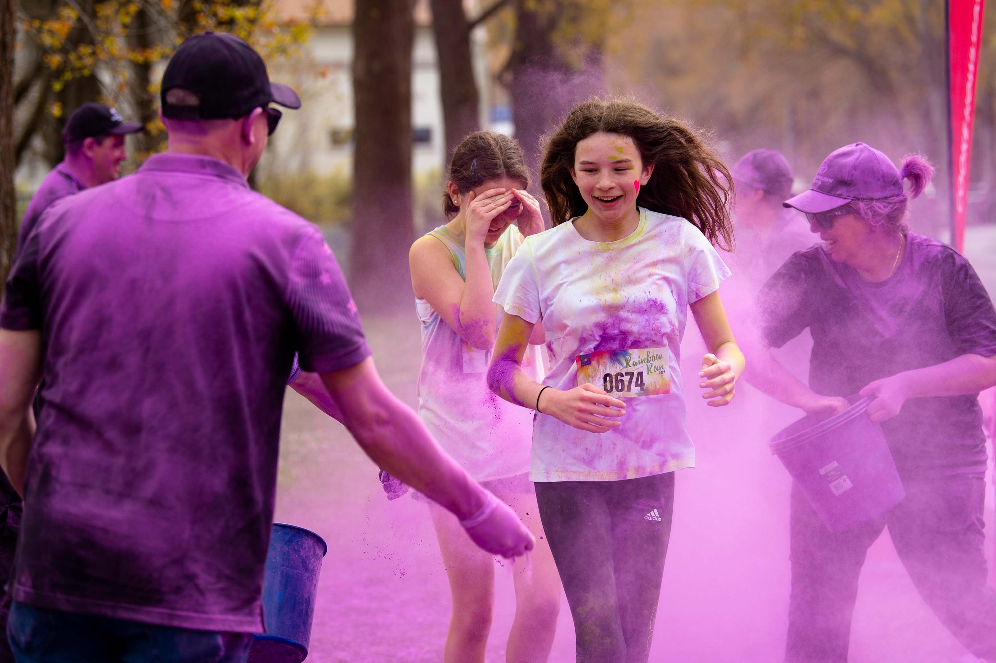 Child running at the Rainbow Run.
