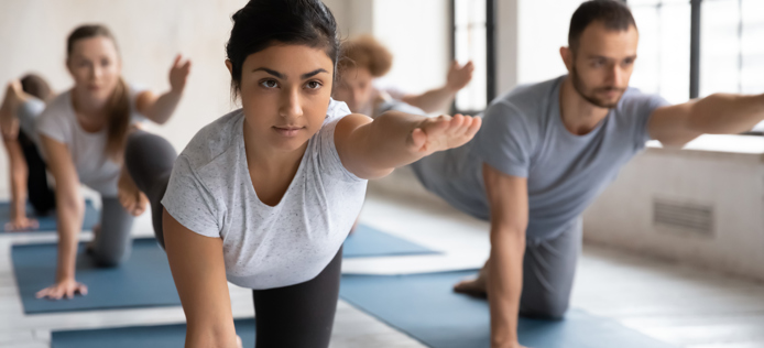people doing yoga poses